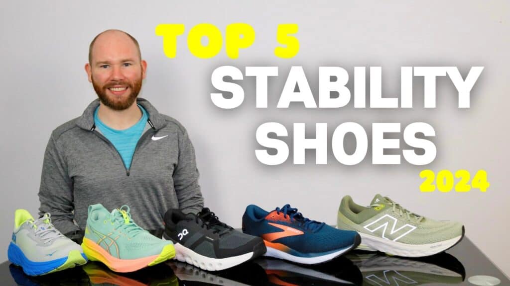 Picture of James McCormack sitting at a desk with 5 stability shoes for review