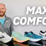 Picture of James McCormack sitting at a desk with 5 of the most comfortable shoes on a desk ready for review