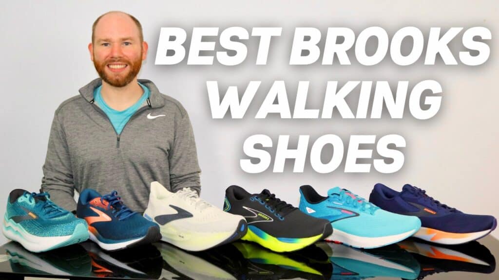 Picture of James McCormack sitting at a desk with 6 brroks shoes to provide a review of the Best Brooks Walking Shoes