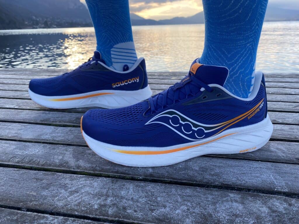 Picture of james mccormack wearing the blue saucony ride 18 at annecy lake