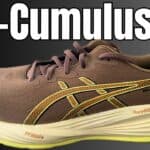 Photo of the Asics Gel Cumulus 27 with a black to grey gradient background and the caption gel-cumulus 27 in white and yellow