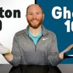 Picture of James McCormack sitting behind a desk providing a review of the Hoka Clifton 9 vs Brooks Ghost 16 while holding one in each hand