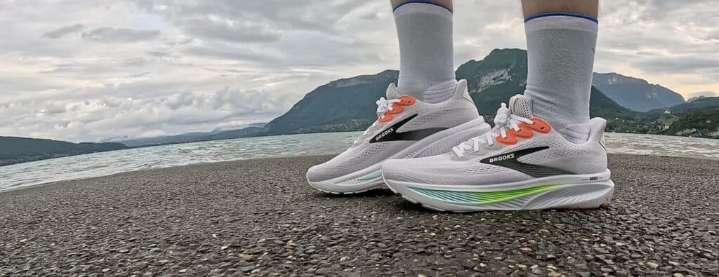 Photo of James McCormack wearing the Brooks Ghost 17 in white orange and green neon