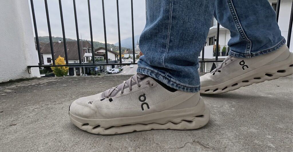 Side view of the ON Cloudtilt walking shoe with CloudTec midsole and flexible forefoot design.