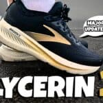 Cover photo of the brooks glycerin 23 from the side in navy and gold with text saying glycerin 23 in white and gold